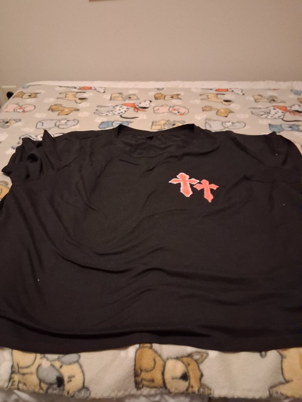 black plus sized womans shirt with pink crosses